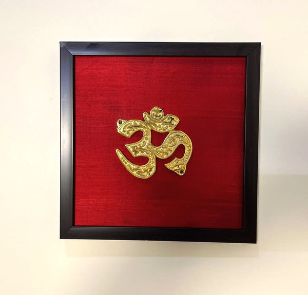 Aum Auspicious Symbol Wall Décor I Om Brass Accent on Red silk backdrop I Brass & Silk Shubh Chinha Wall Frame I 9 Inch by 9 Inch