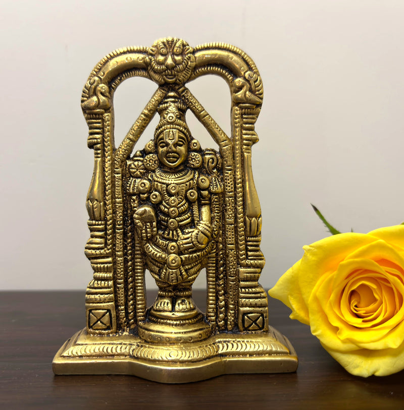 This captivating small Venkateshwara sculpture & holds the deity as Lord Balaji of Tirupati