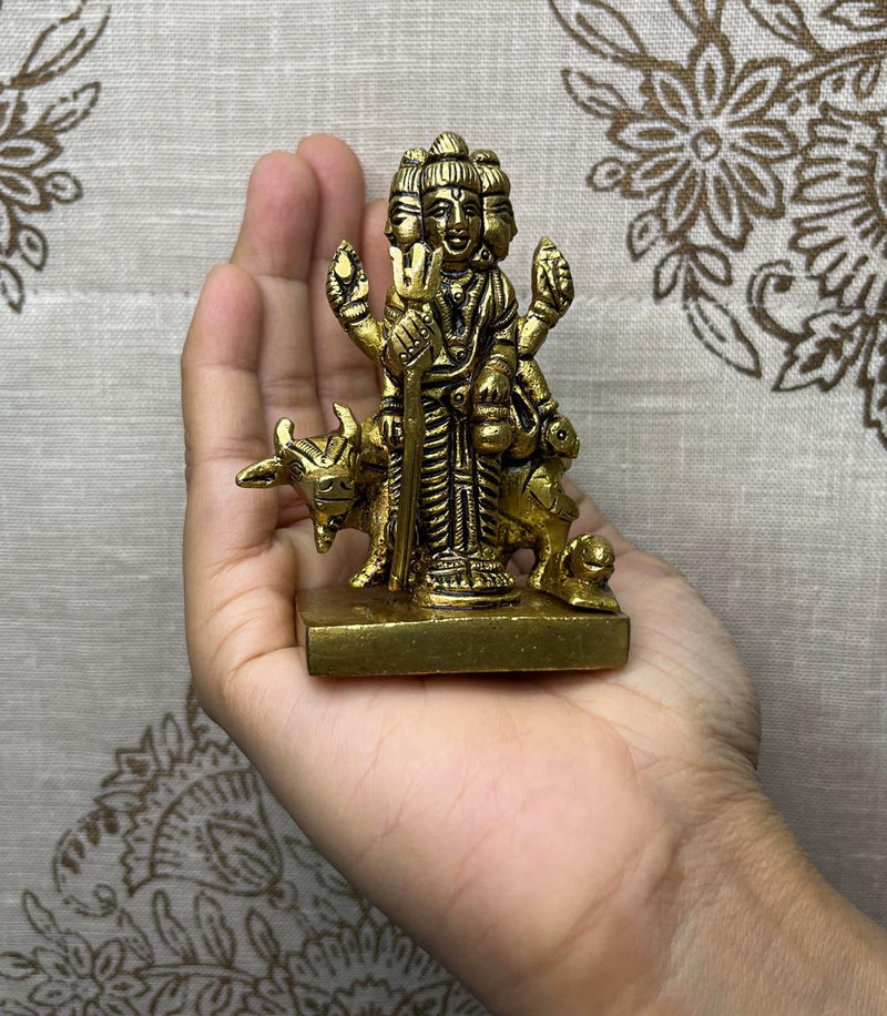 This idol is made of fine Brass having a Golden Yellow finish, having elegant carvings and an antique look, adding a divine aura to life