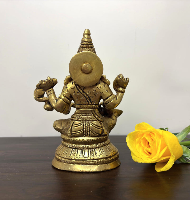 This idol is made of fine Brass having Golden Yellow finish having elegant carvings and antique look