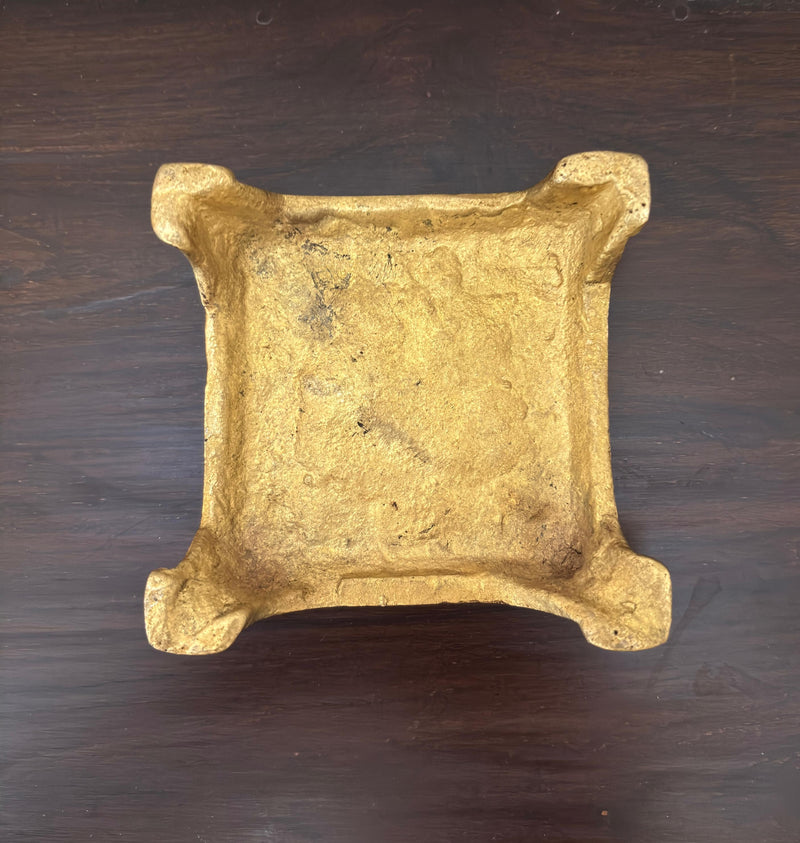 The warm, golden hue of the brass