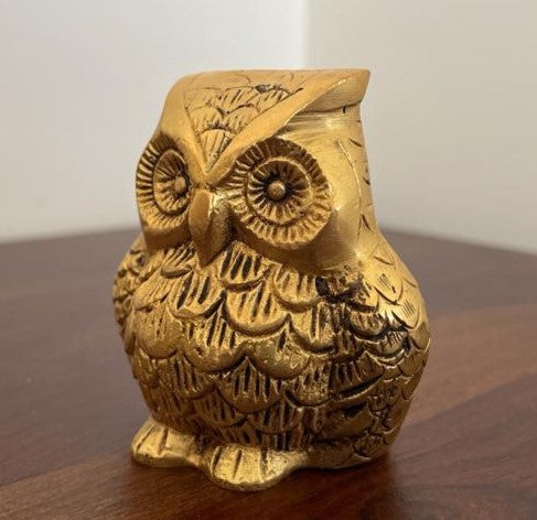 Invite good fortune into your home with this captivating handcrafted statue of Owl