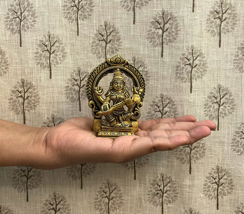 This idol is made of fine Brass having Golden Yellow finish having elegant carvings and antique look