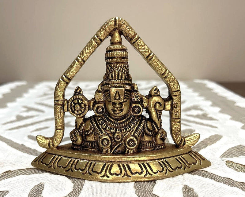 This exquisitely carved pure Brass Idol of Lord Balaji Venkateswar swami bust is a table top décor