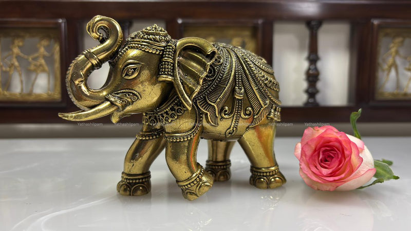Cultural Significance of a Trunk Up Elephant