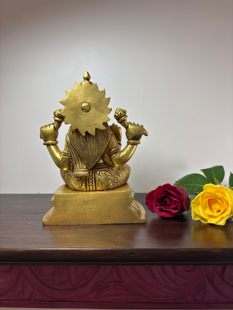 This idol is made of fine Brass having Golden Yellow finish having elegant carvings and antique look