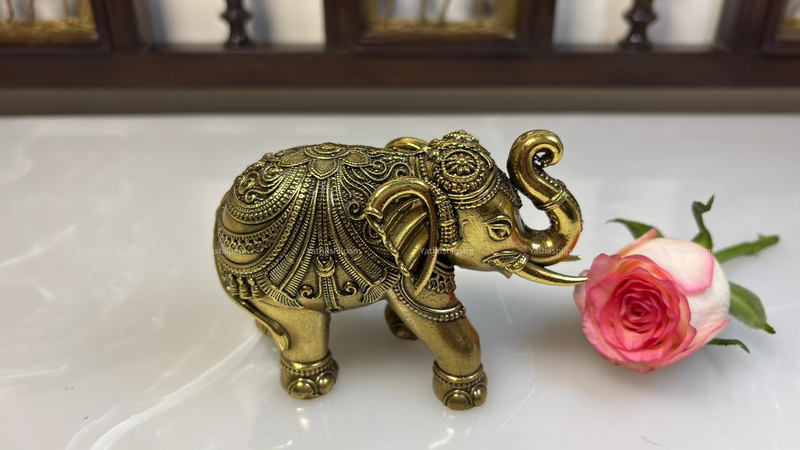 Cultural Significance of a Trunk Up Elephant