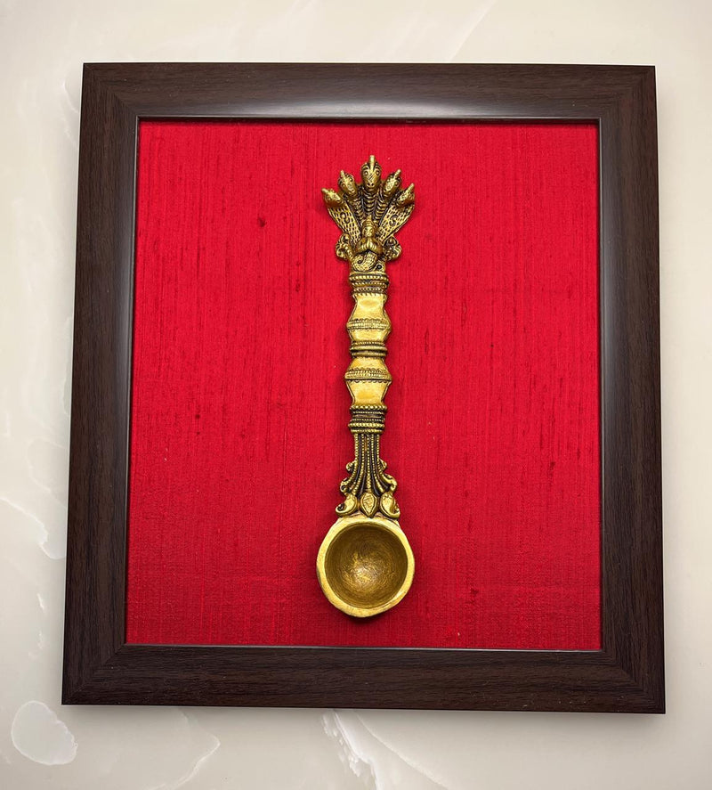 The wall art has elegant carvings and antique decor look
