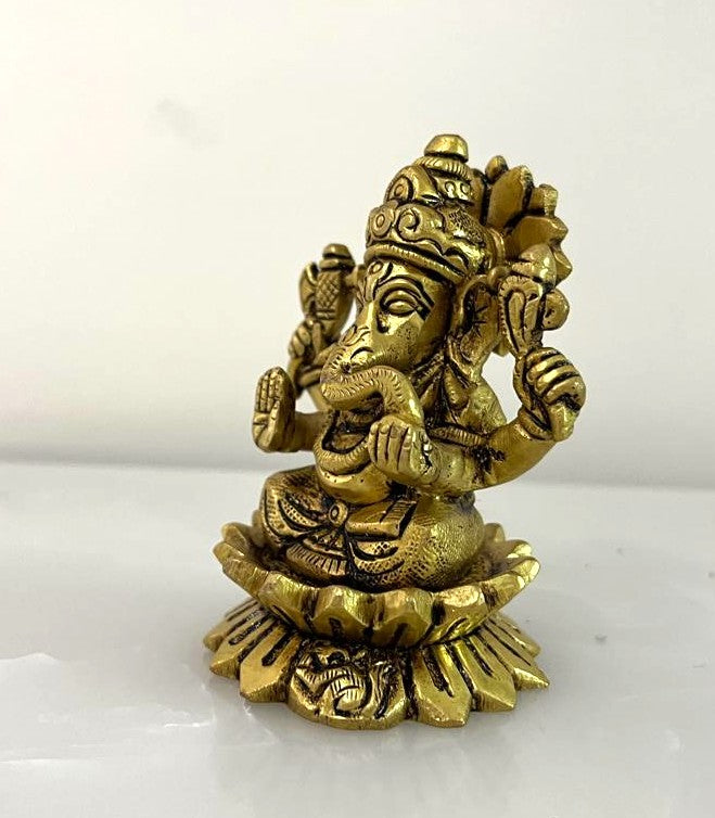 This exquisite small sculpture of Lord Ganesha is handcrafted by skilled artisans in India