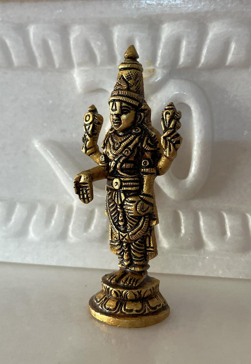 This small sculpture is handcrafted by skilled metal work artisans in India carrying the rich tradition of metalworking passed down through generations