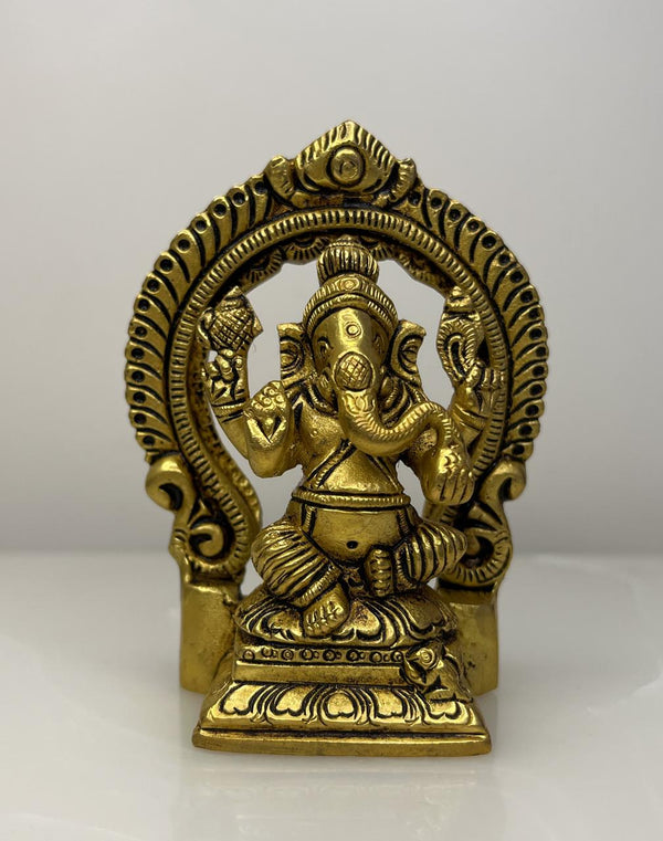 Yathashilpam 3.5" Brass Lord Ganesh idol with Prabhawali Backdrop