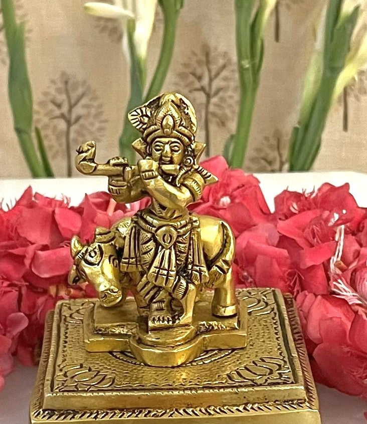 This 3” small Lord Krishna with Cow and Flute brass idol