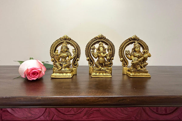 Yathashilpam 3.5"Set of Goddess Lakshmi , Lord Ganesh & Goddess Saraswati Idol With Prabhawali Backdrop I Brass Lakshmi Ganesh Saraswati