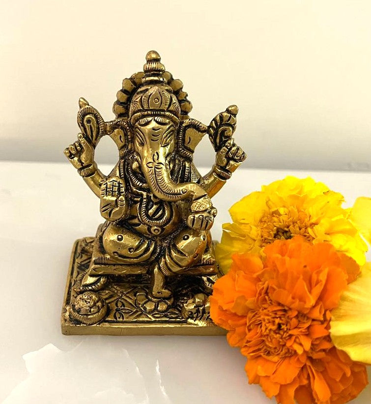 Bring the auspicious presence of Lord Ganesha with this exquisitely carved Brass Ganesha idol.