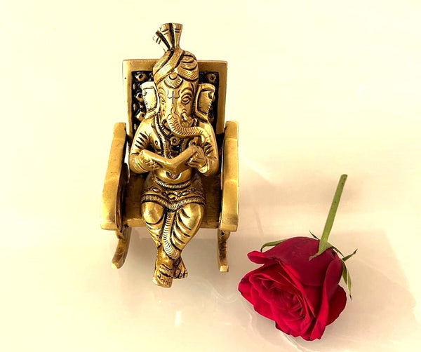 Yathashilpam 5" Studying Lord Ganesha on a Rocking Chair idol in Brass