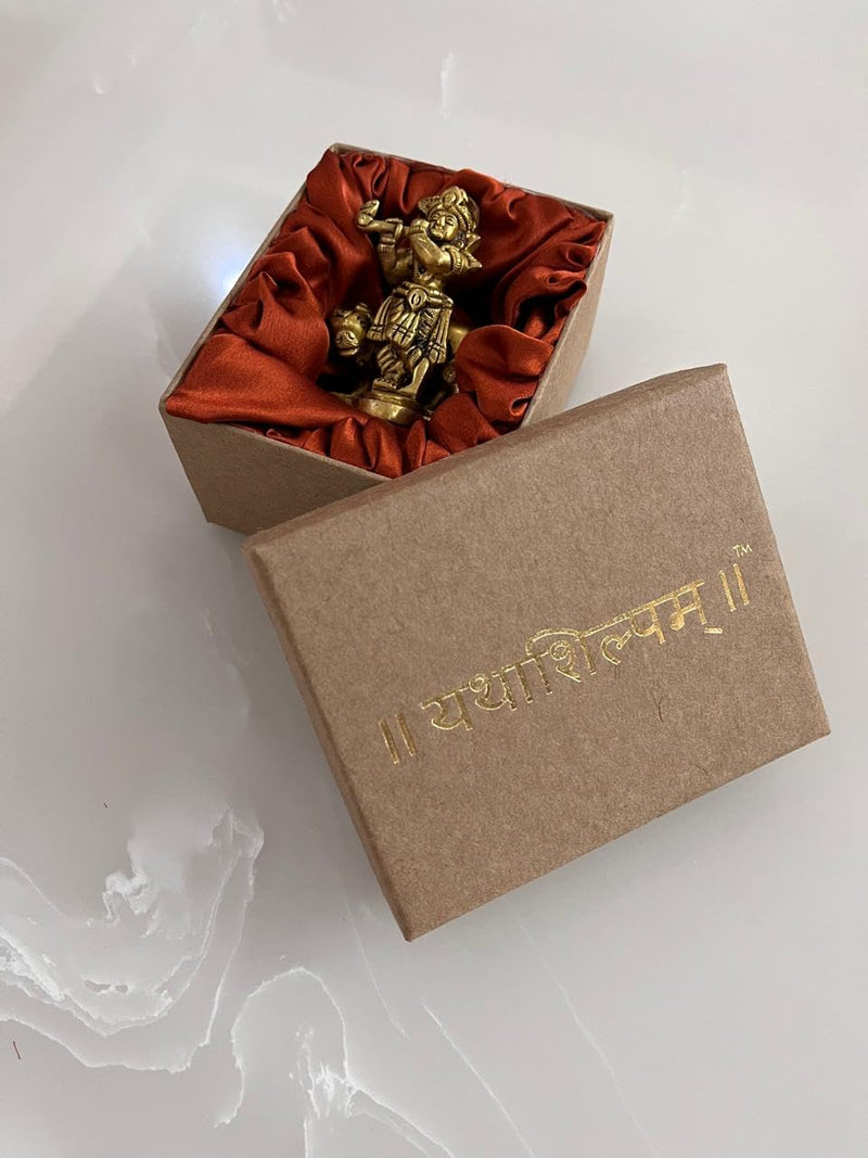 The idol is made of pure brass, giving it a radiant golden finish that enhances its divine aura