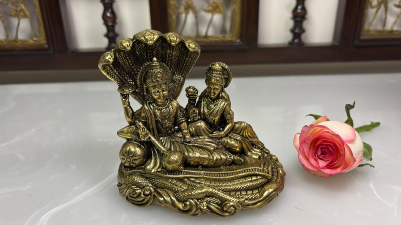 Vishnu Lakshmi on Shesh Naag: The symbolism