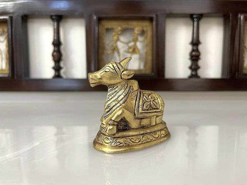 The intricate detailing and the golden hue of the brass elevate the craftmanship making it a cherished addition to any sacred space.