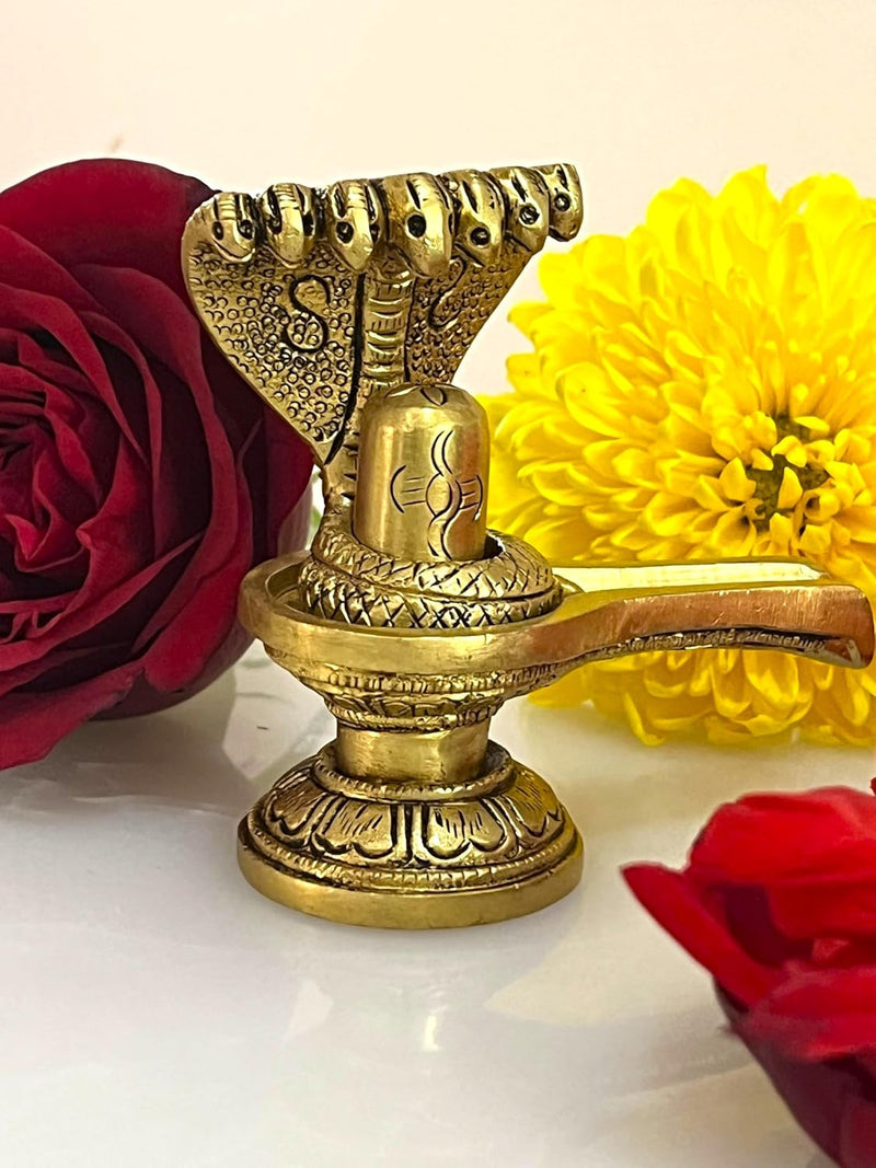 The intricate detailing adorning the base of the Linga adds to its beauty &amp; reflects a deep understanding of traditional Indian craftsmanship