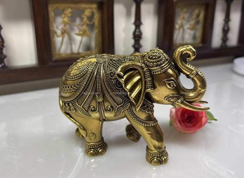 Cultural Significance of a Trunk Up Elephant