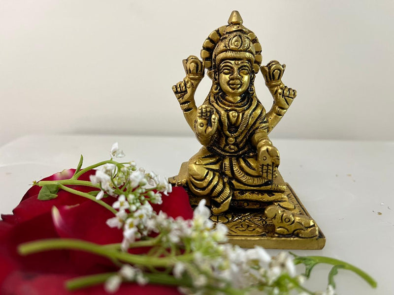 In this idol set Lord Ganesh ji &amp; Goddess Lakshmi ji sitting graciously in a blessings posture radiating serenity and power