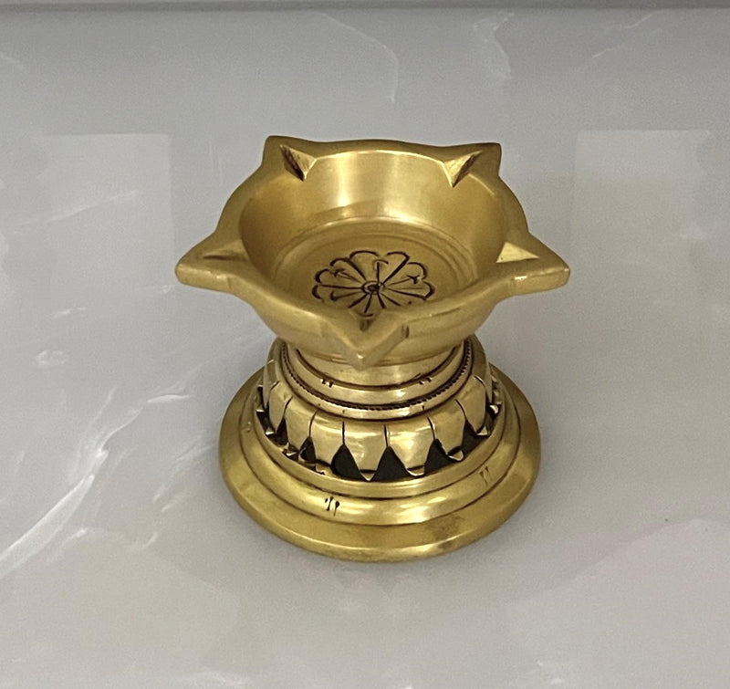 This Five Wick (Panchmukhi) Diya is made of fine Brass having Golden Yellow Antique finish