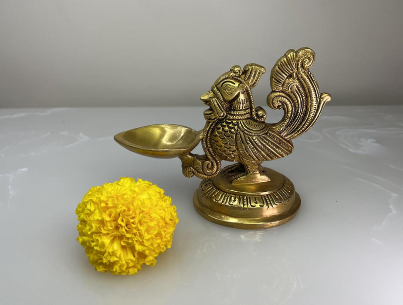 Brass, a revered metal in Hindu culture, is believed to possess inherent purifying properties, making it an ideal material for sacred objects