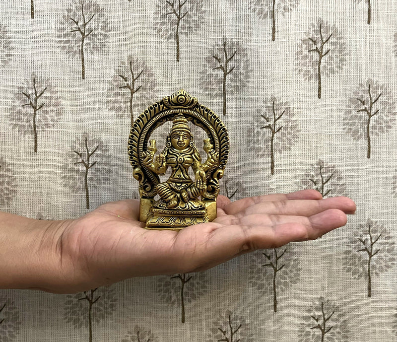 This idol is made of fine Brass having Golden Yellow finish having elegant carvings and antique look