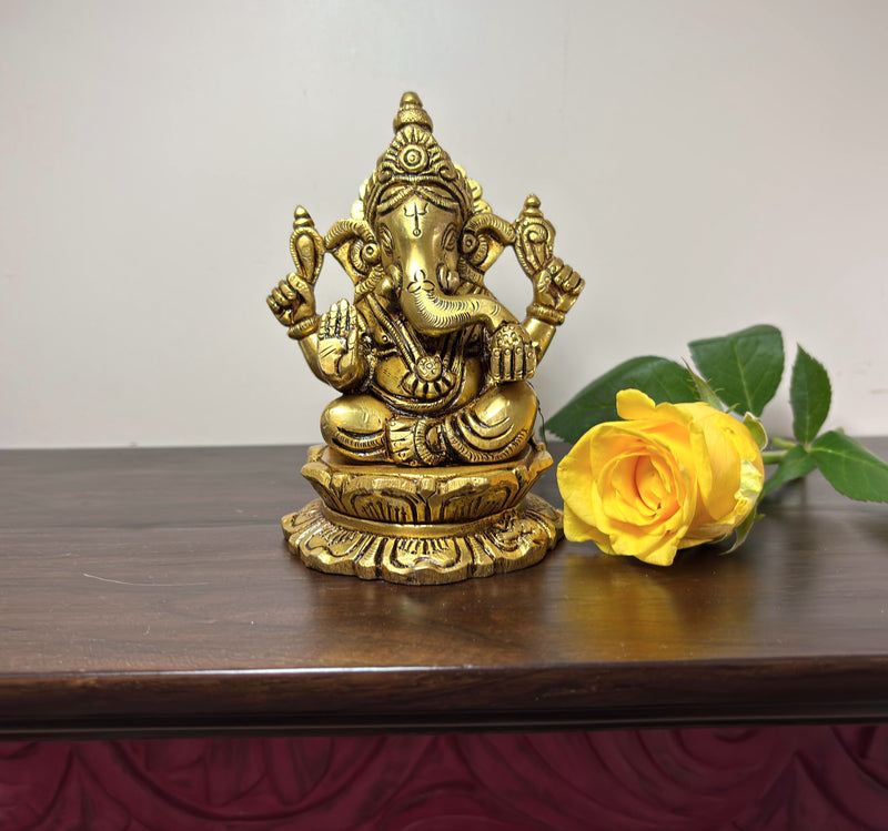 Bring the auspicious presence of Lord Ganesha with this exquisitely carved Brass Ganesha idol