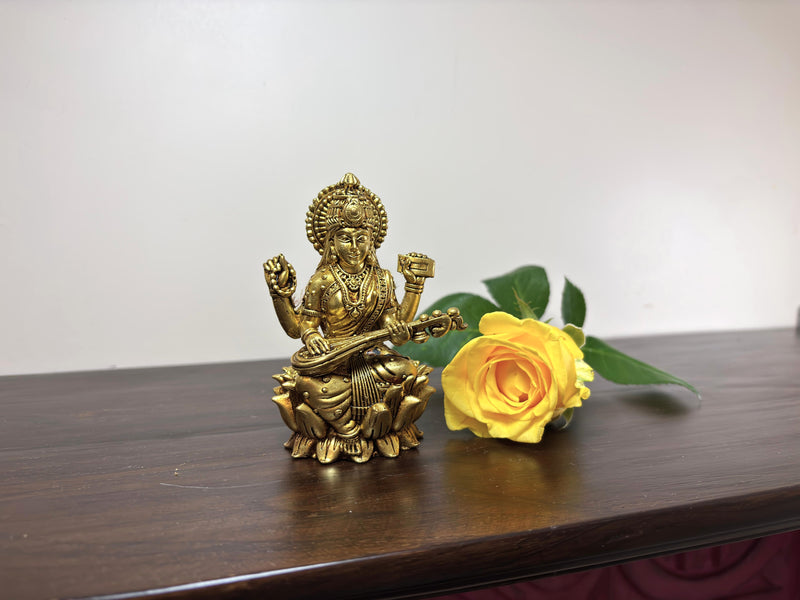 Crafted with precision in pure brass, this statue depicts the Goddess in a posture of serene grace radiating tranquillity and inspiration