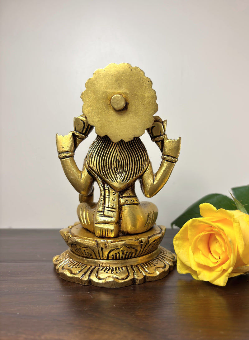 This idol is made of fine Brass having Golden Yellow finish having elegant carvings and antique look